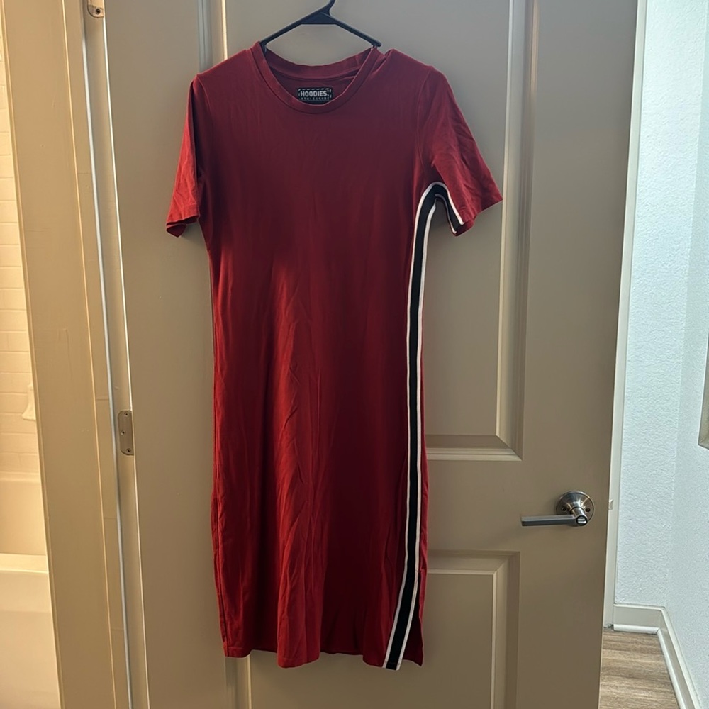 Red dress with black and white stripe on the side